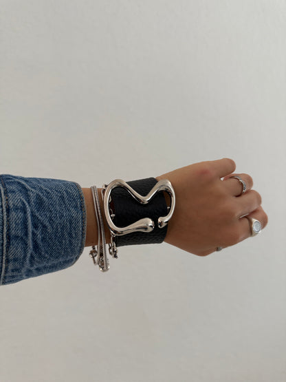 Curved Metal Leather Cuff